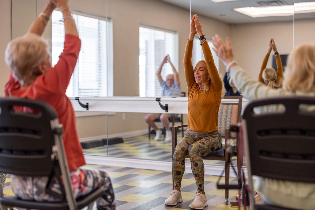 woman leading yoga