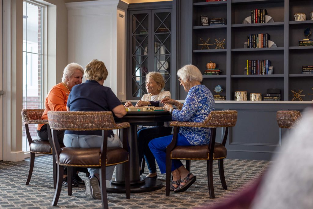 women chatting at table
