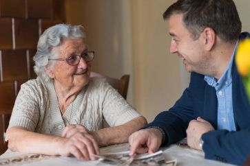 woman discussing senior living plans with an advisor